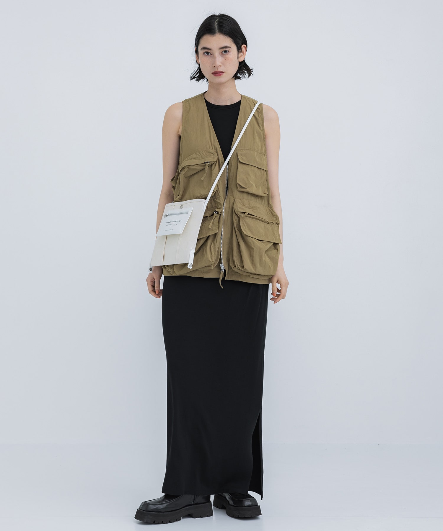 lining logo pocket mini shoulder bag beautiful people