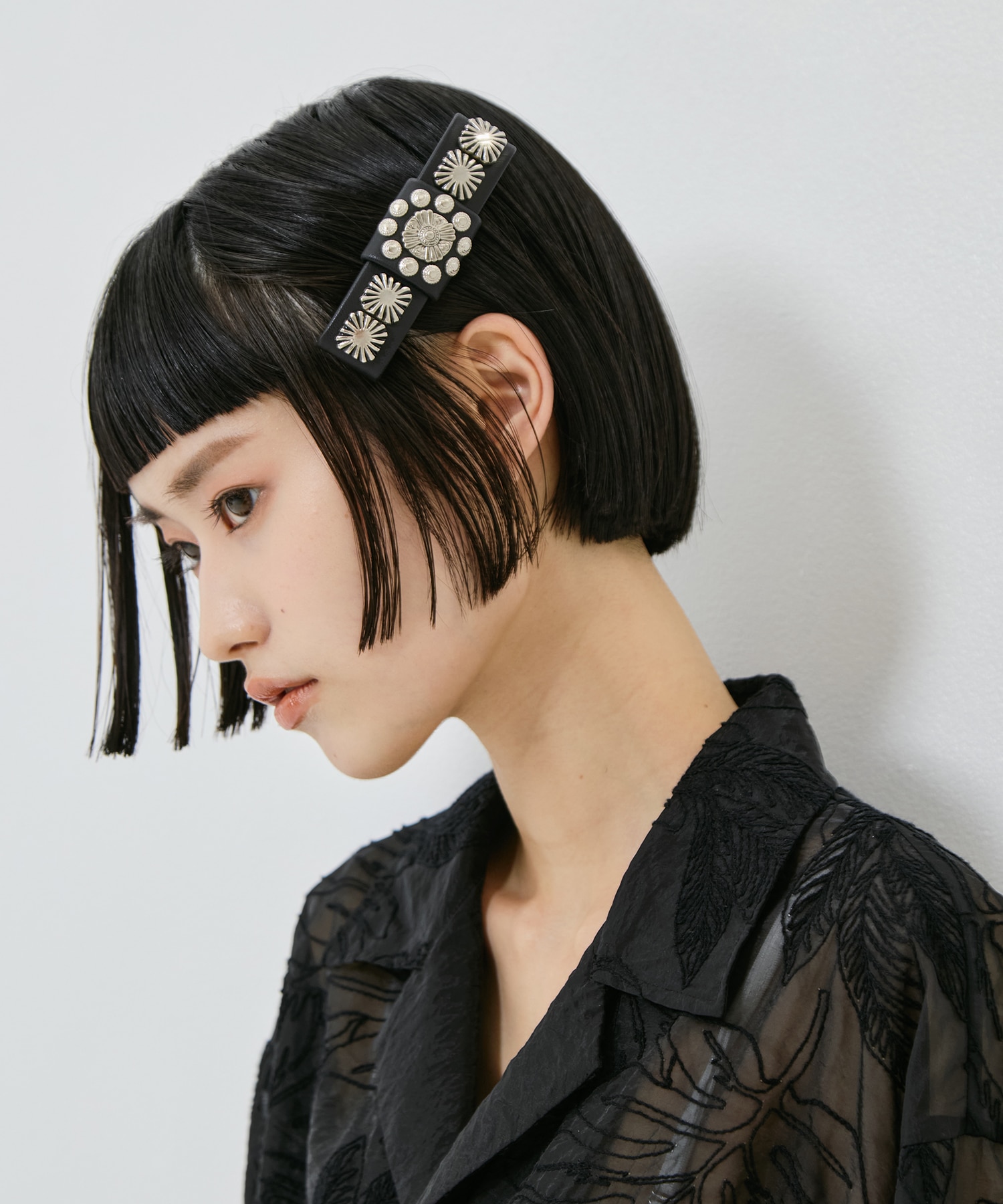 Concho leather barrette TOGA