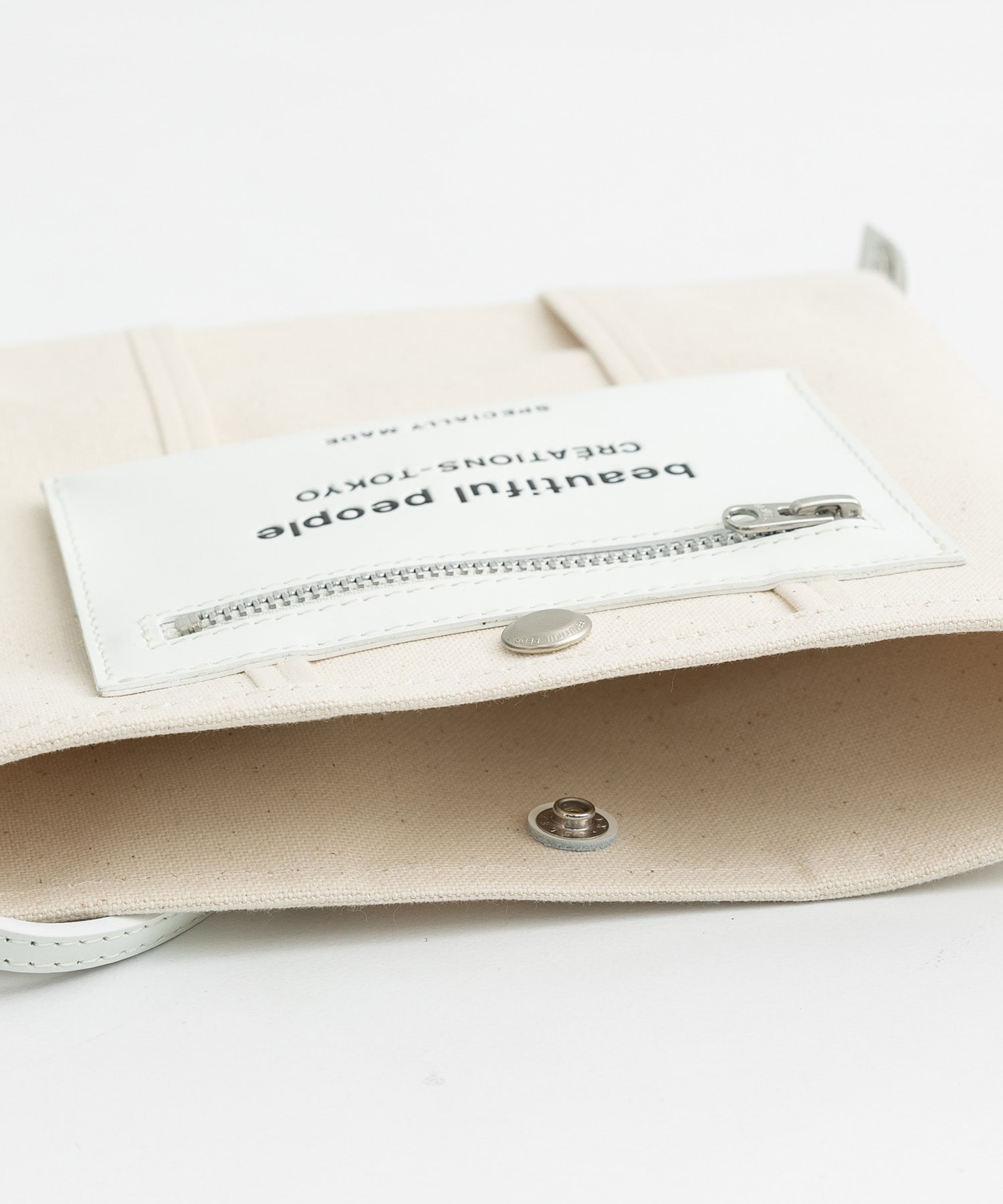 lining logo pocket mini shoulder bag beautiful people