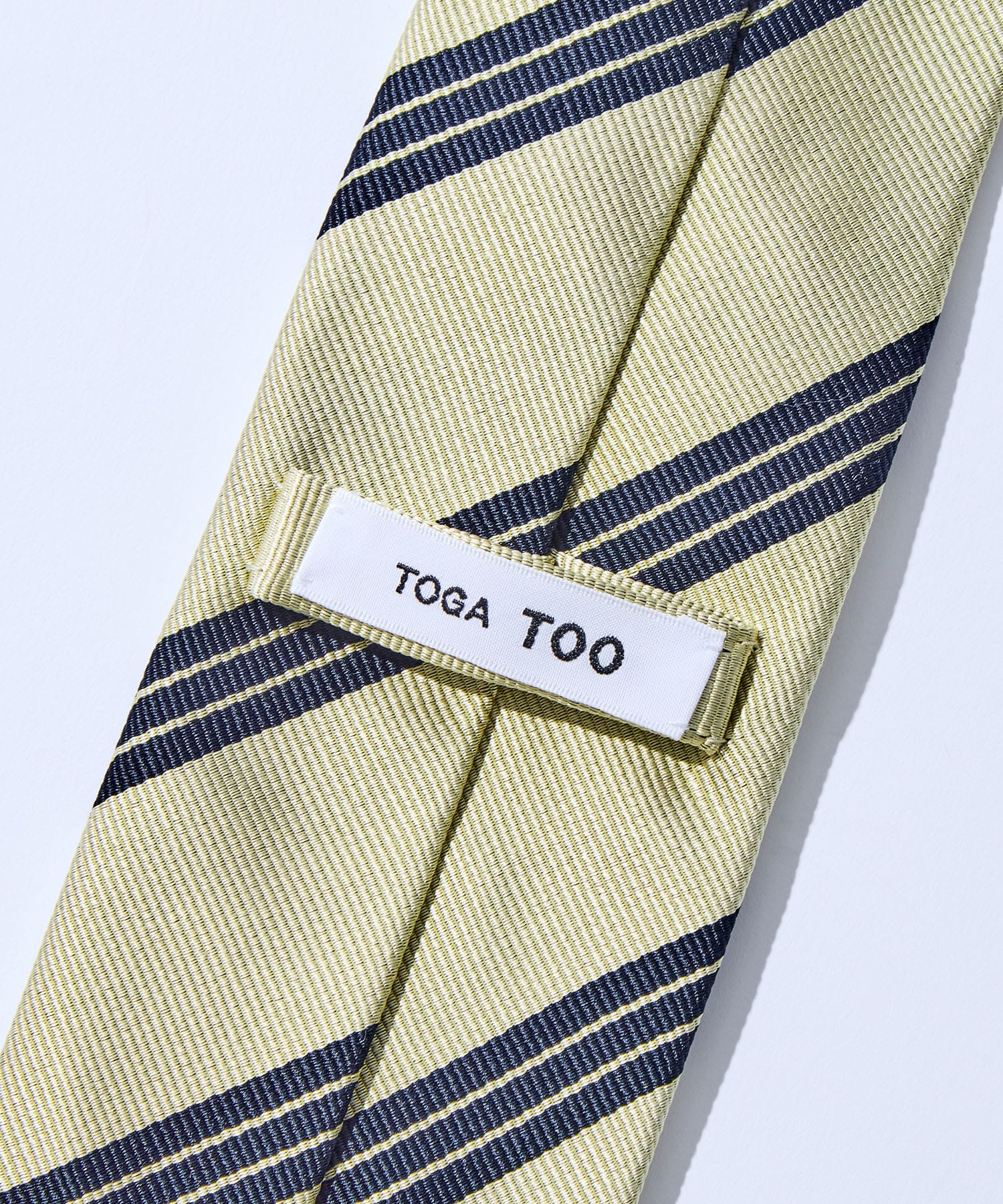Metal concho tie TOGA