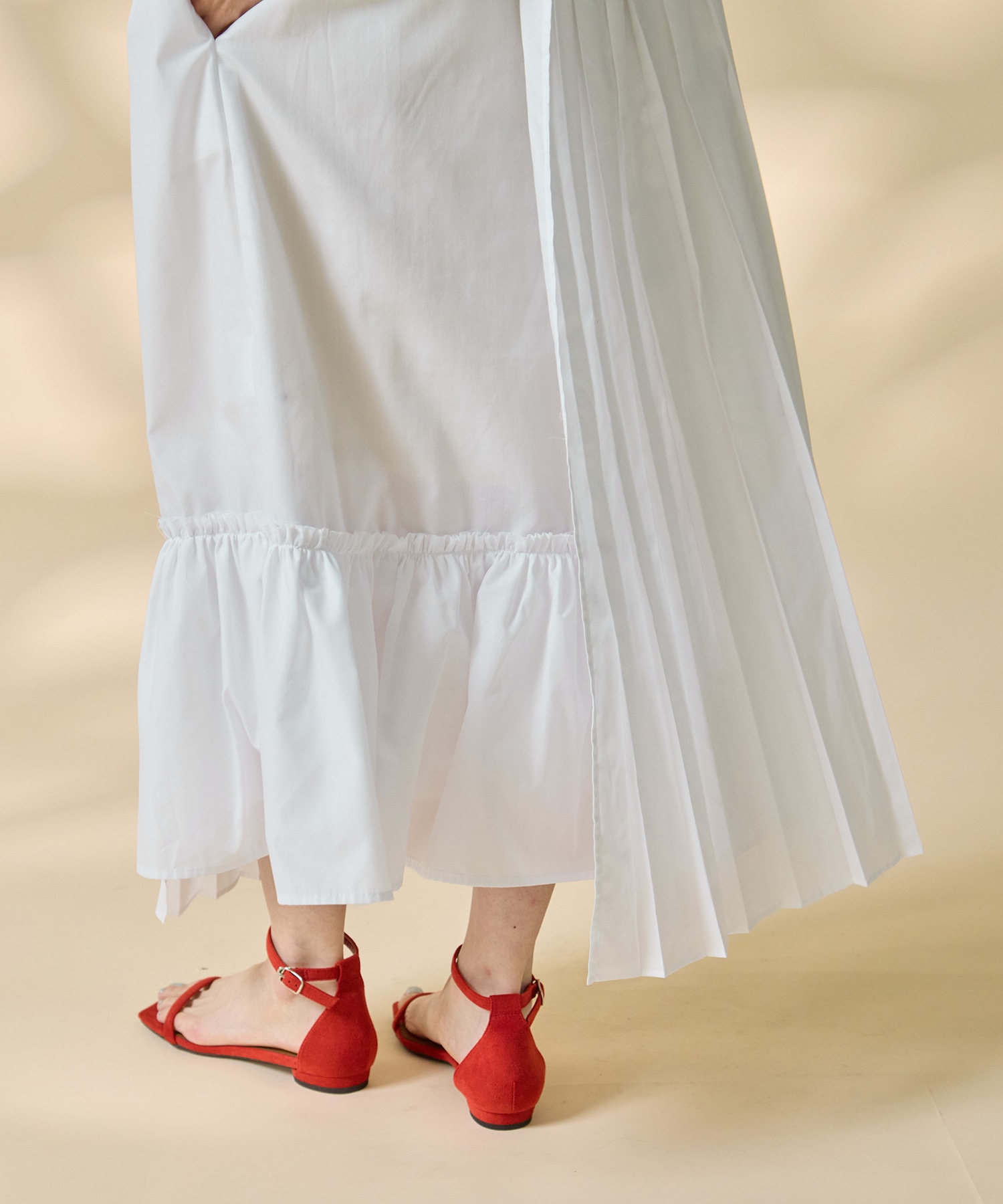 Asymmetry pleats one-piece STUDIOUS