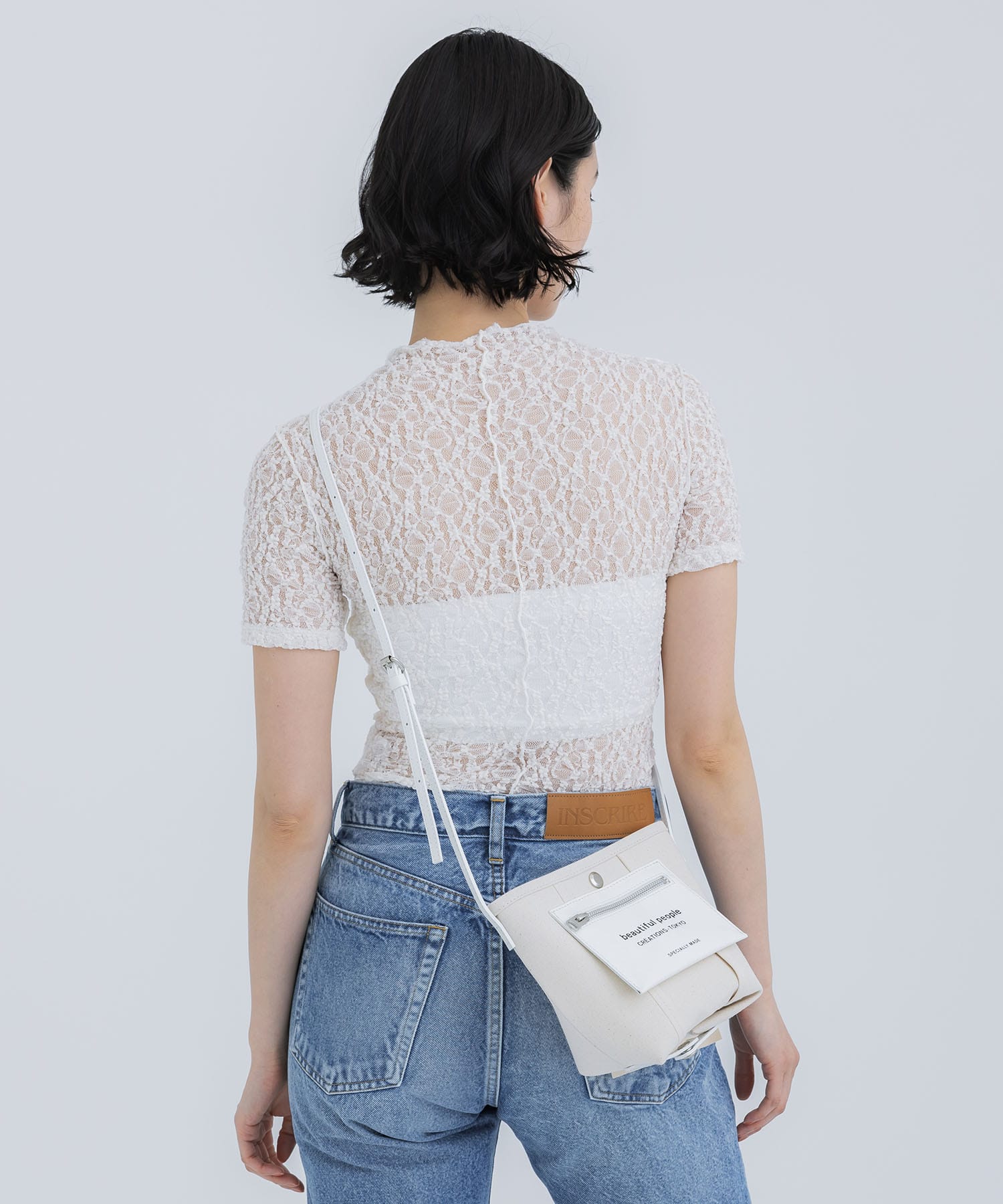 lining logo pocket mini shoulder bag beautiful people