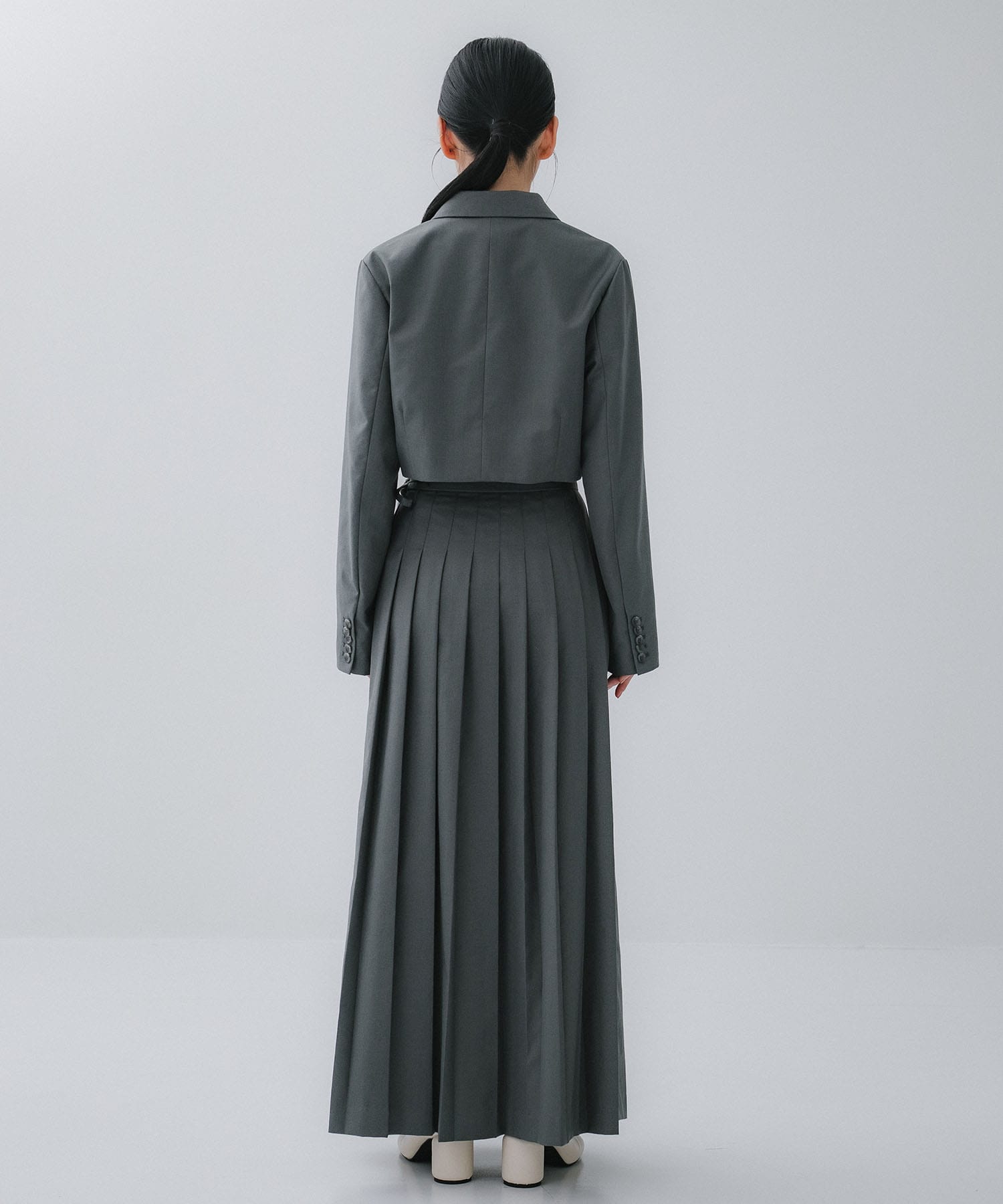 SHORT JACKET WITH PLEATS WRAP SKIRT AMERI